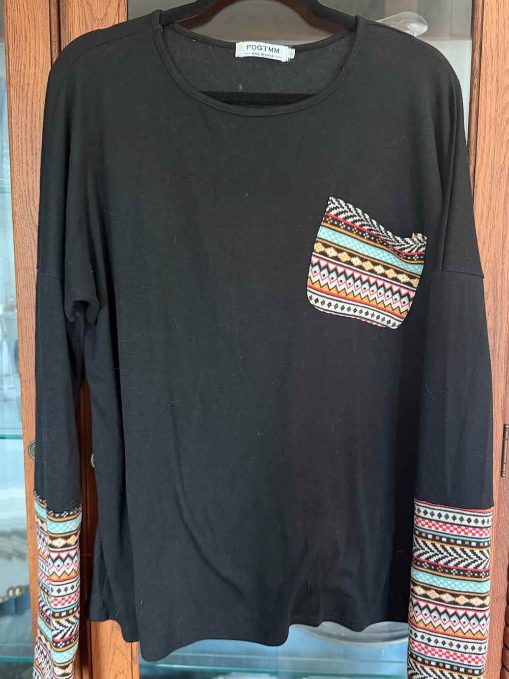 POGTM Black Top with Patterned Pocket and Sleeve Trim & thumb sleeves